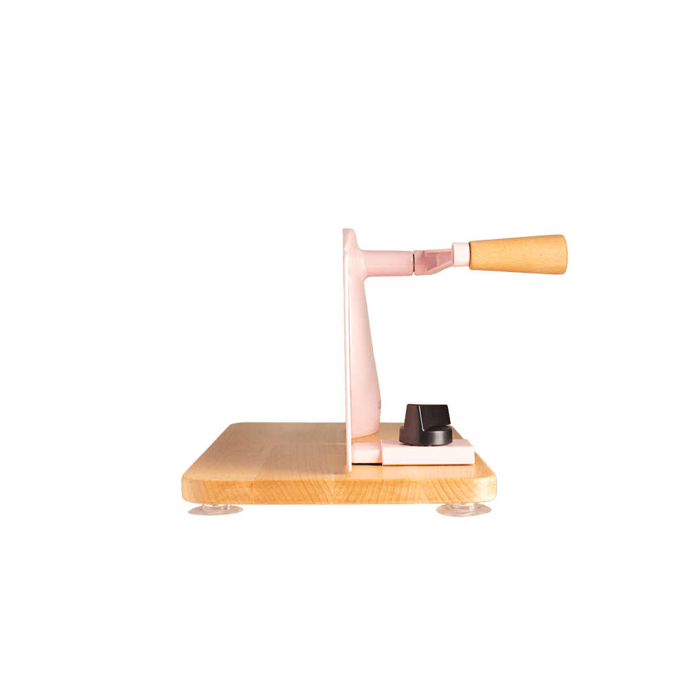 Retro-Hand-Allesschneider in Hellrosa mit Vollholzplatte